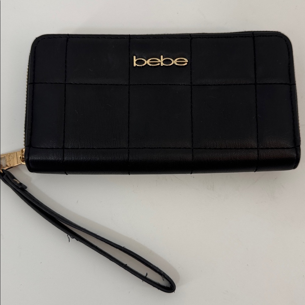 bebe black quilted style wristband Wallet with gold accents.. NWOT